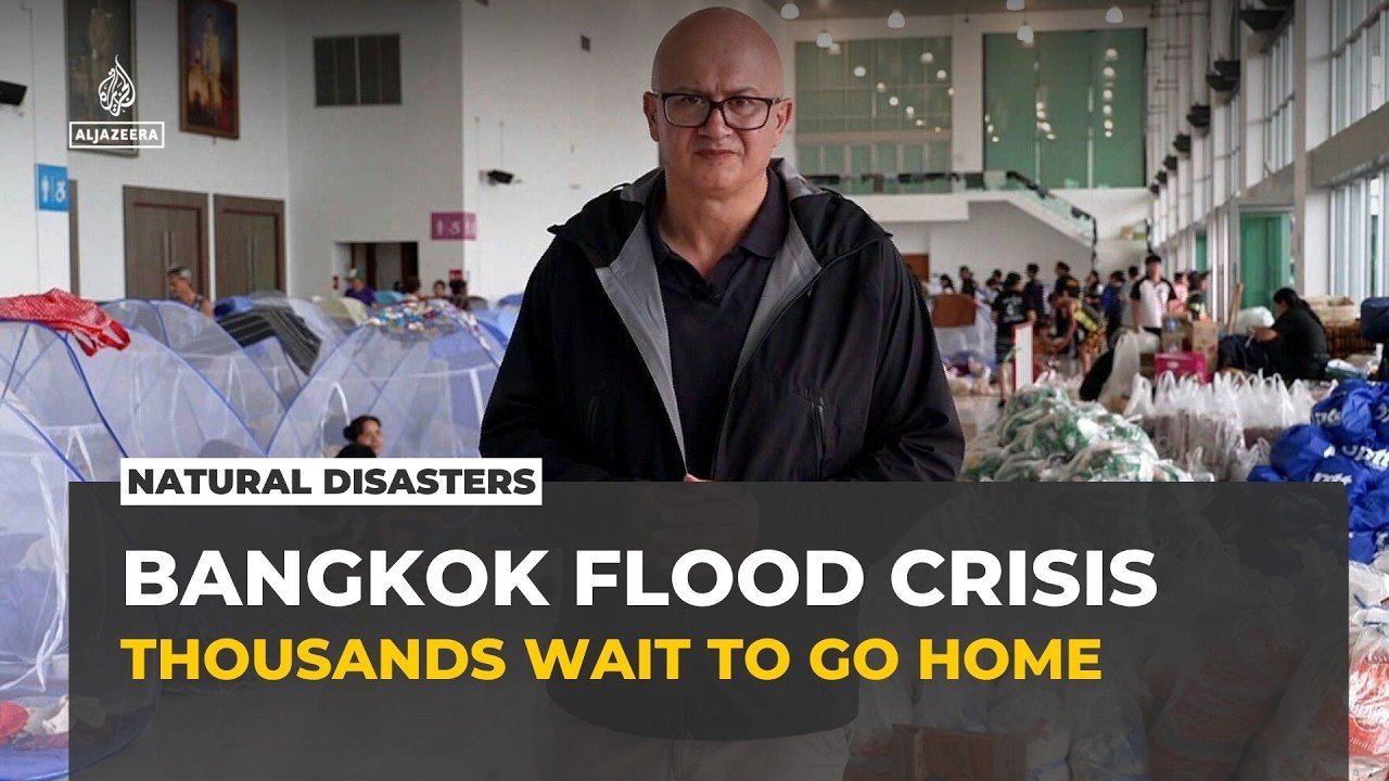 Bangkok floods displace thousands as waters remain slow to recede