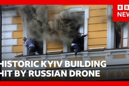 People flee burning building in Ukraine after Russian drone strike | BBC News
