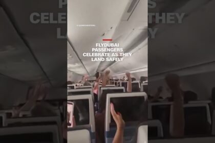 Flydubai passengers celebrate as they land safely