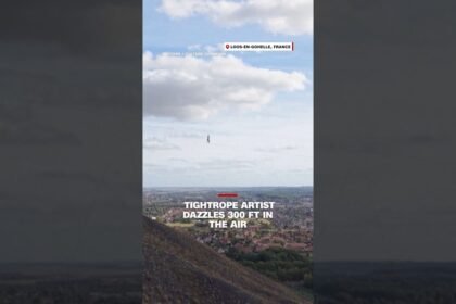Tightrope artist dazzles 300 ft in the air