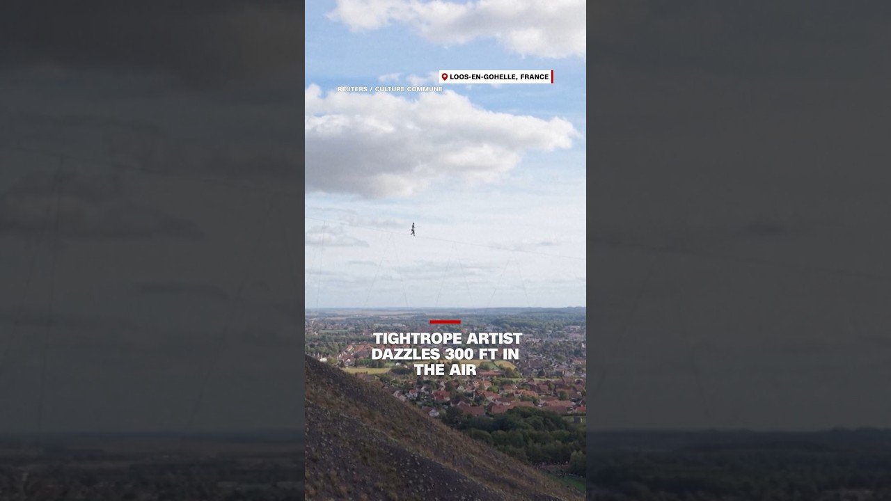 Tightrope artist dazzles 300 ft in the air