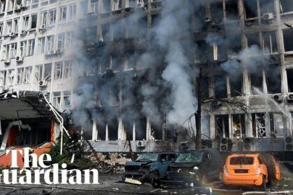 Footage shows people fleeing as drone strikes business centre in Kyiv
