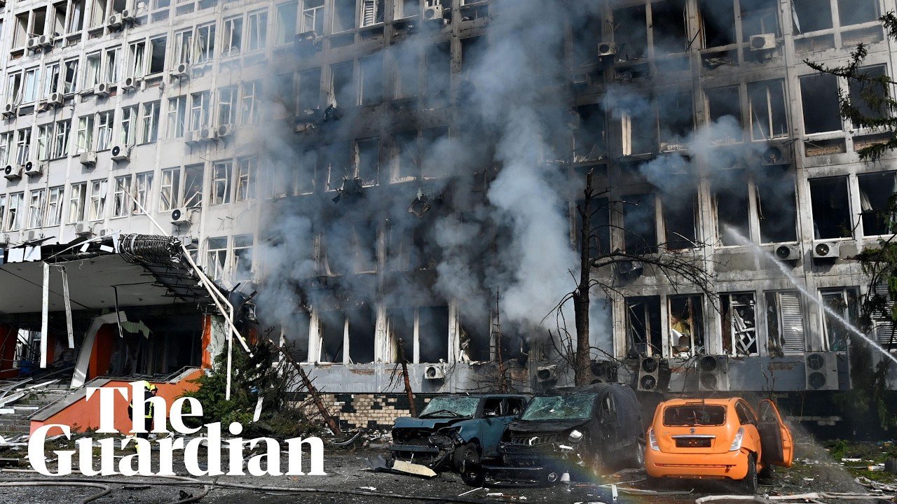 Footage shows people fleeing as drone strikes business centre in Kyiv