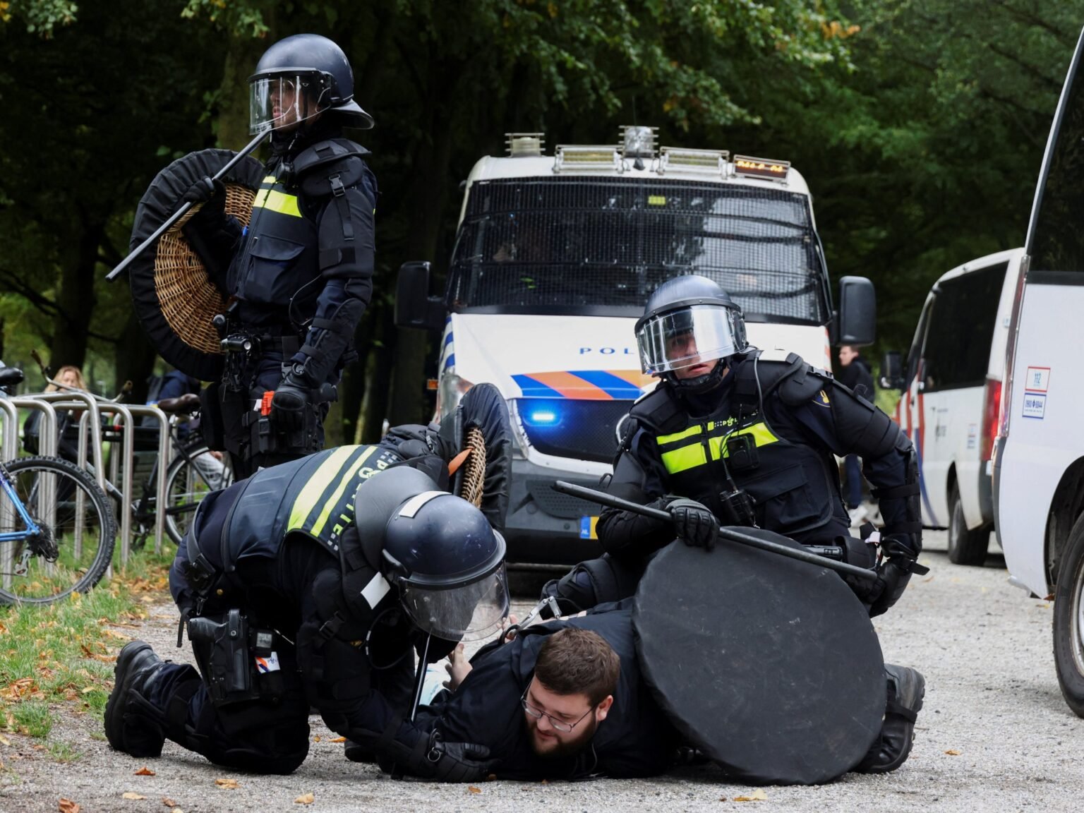 Dutch riot police break up violent far-right protest in The Hague
