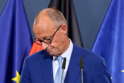 Under-pressure German leader says state election result a 'disaster'