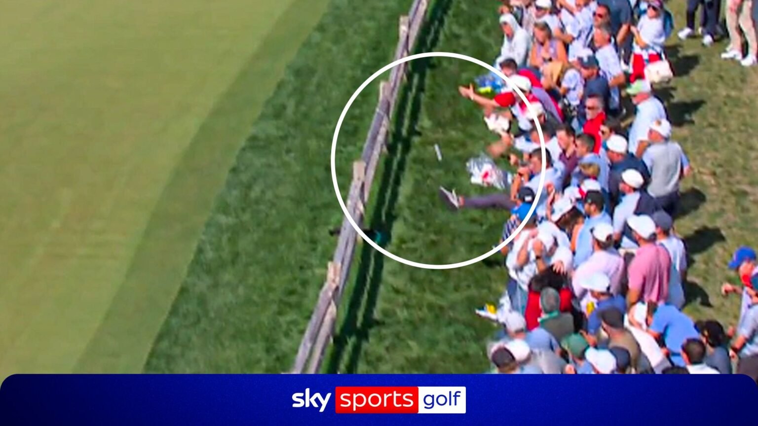 'Somebody KICKED it?!' - Conners approach shot volleyed onto the green by a fan!