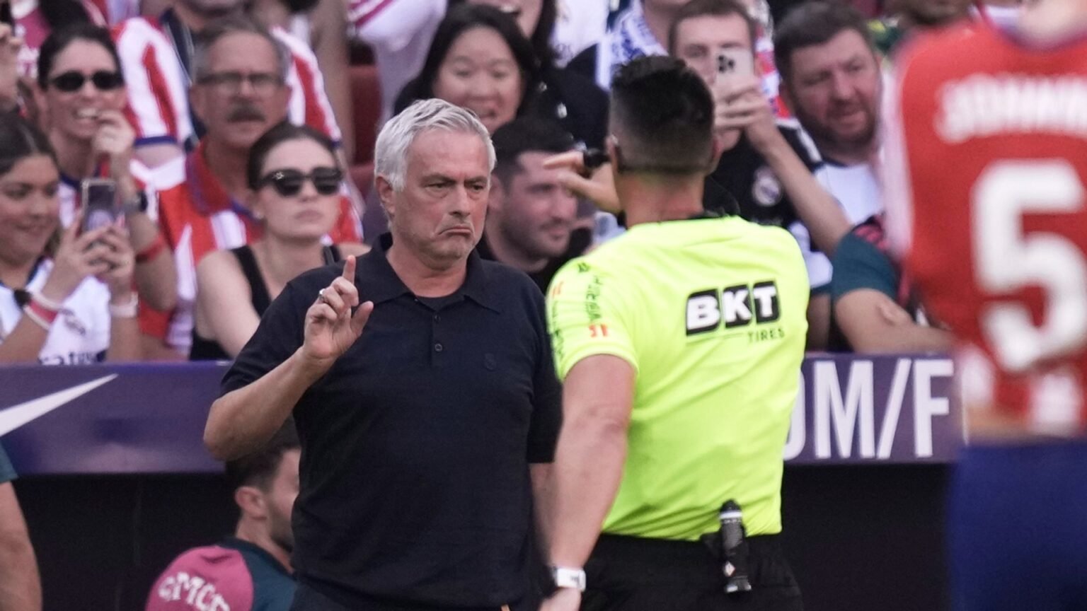 Furious Mourinho holds up pictures of ref errors after Madrid derby defeat