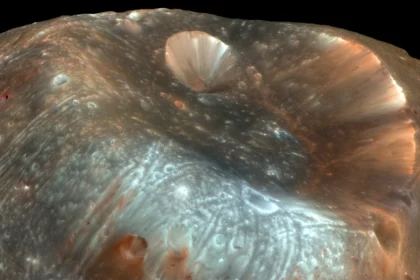 A giant crater may reveal the origin of Mars’ doomed moon