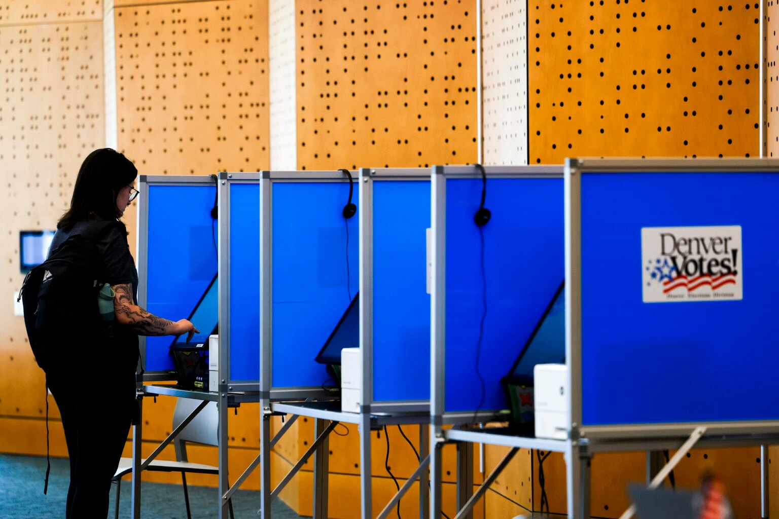 It's illegal for armed federal officers to be at polls. Lawsuits seek to ensure that