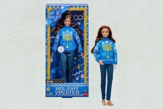 Barbie’s First Official Hanukkah Doll Is Wearing a Menorah Sweater That Actually Lights Up