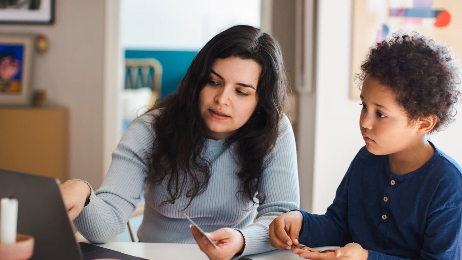 Gen Alpha kids are earning money. Here's how parents can help them save and invest