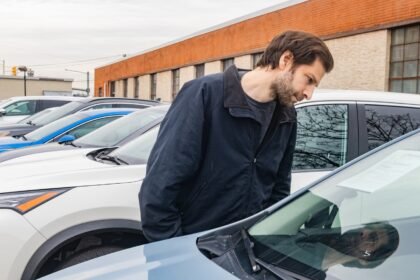 Car buyers are stretching loans to afford payments — it's a 'potential warning light,' analyst says