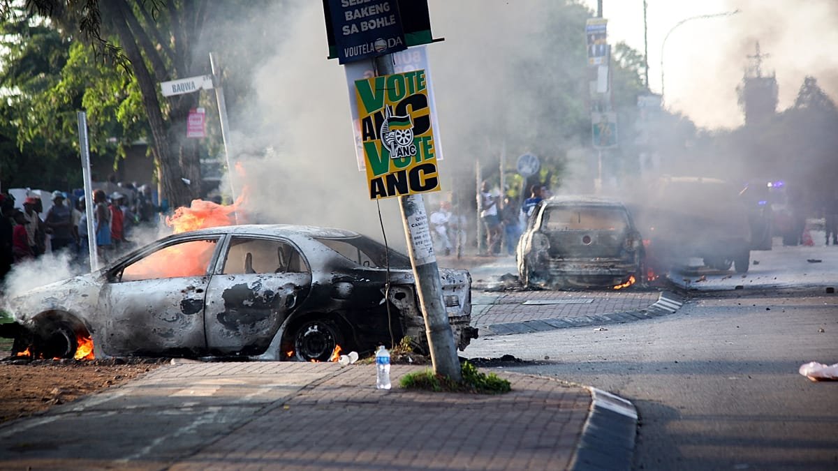 Cars burned and shops looted as anti-immigration protests rock South Africa