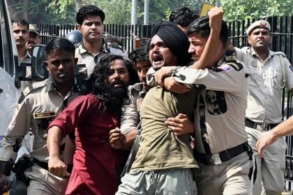 Thousands detained in New Delhi as police crack down on 'cockroach' movement