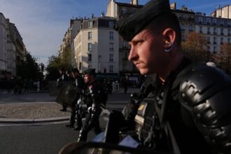 Tear gas and fireworks as student protests turn violent in Paris