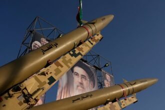 Iran insists it controls Hormuz as rial hits record low and exports dry up