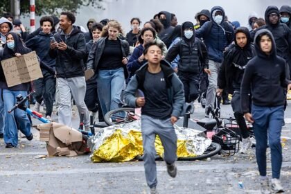 Police clash with protesters in Brussels as thousands march against spending cuts
