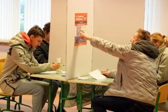 Latvians head to the polls amid concerns over rising cost of living and Russia