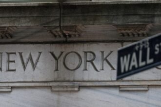US stock market hits all-time high as investors bet big on AI