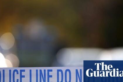 Met launches murder inquiry after man shot dead at London memorial service