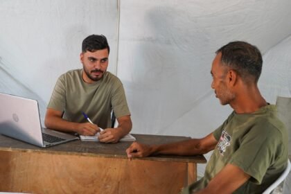 When streets become a workplace: Gaza workers convert tents into offices