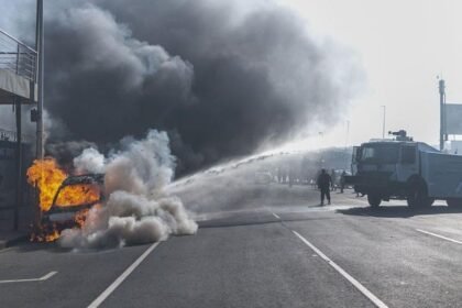 Cars torched and shops looted as anti-migrant violence erupts in South Africa