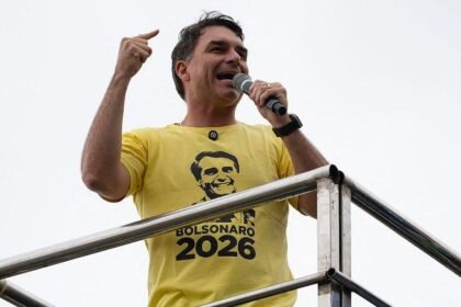 Flávio Bolsonaro rides right-wing wave to win first round of Brazil election