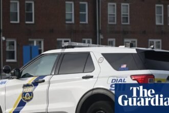 Man with gun kills one Philadelphia police officer and injures another