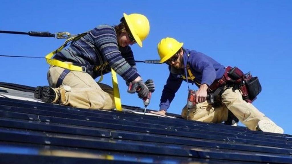 Why are more roofs not made of solar tiles?