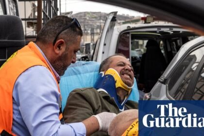 Israeli settlers beat press photographer as soldiers watch in West Bank