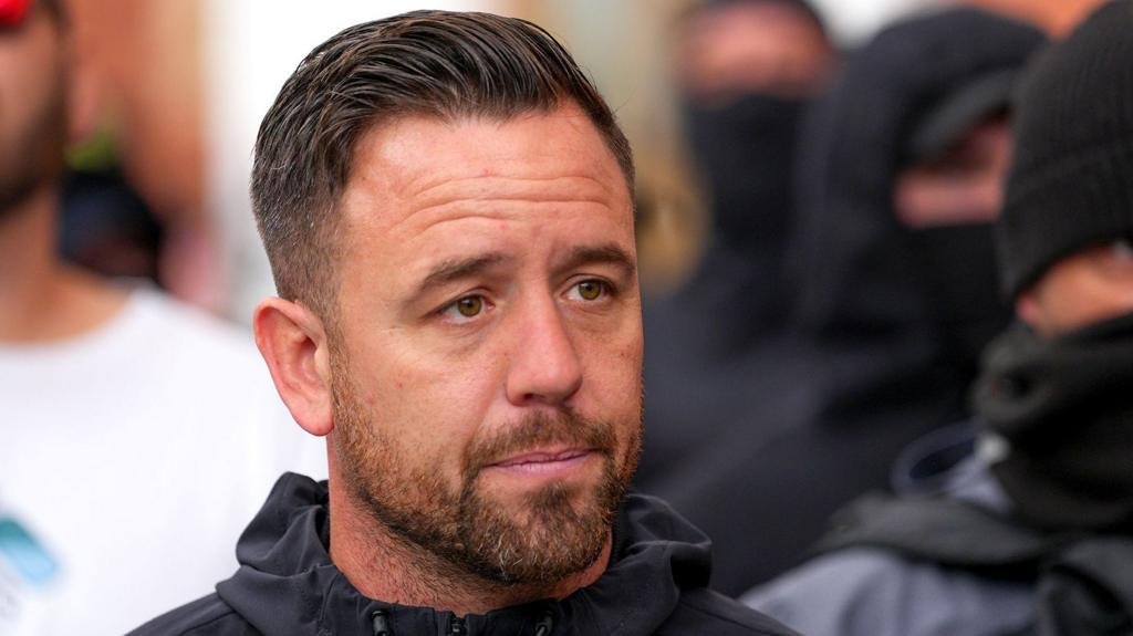 Daniel Thomas in court accused of entering migrant site