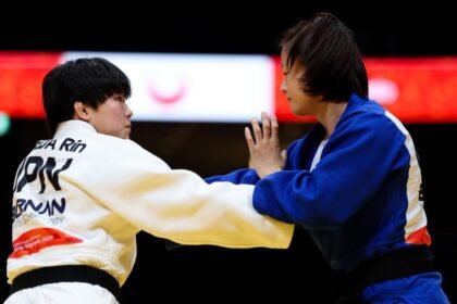 China's Tang disqualified after alleged bite