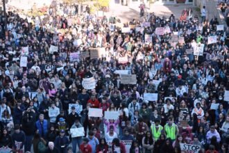 Hundreds join protest at Cornell University to call for frat members to be expelled after rape allegations