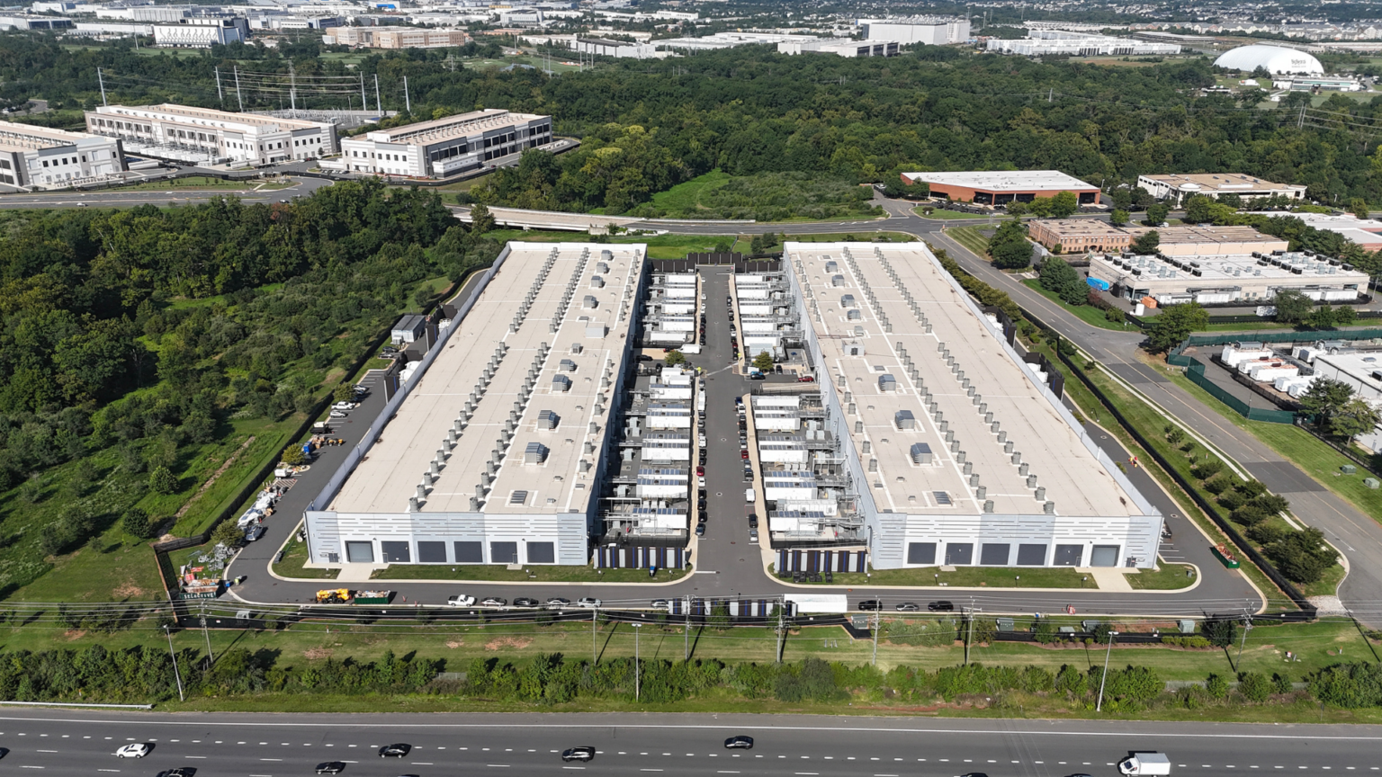 Amazon promises to spend $1 billion on communities close to its data centers, but critics push back