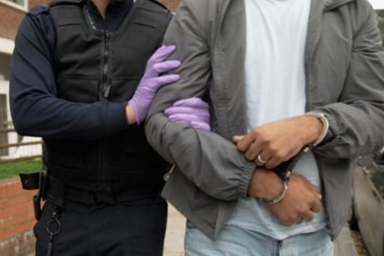 Three arrested after raid on gang accused of helping migrants pretend to be gay to get asylum