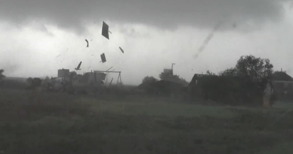 Debris flies across central Kansas as storms slam Plains
