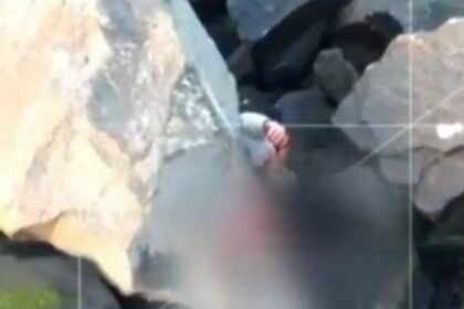 Man trapped under boulder survives after Siri calls for help