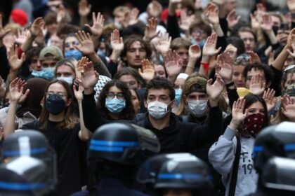 Riot police clash with students in Paris protests