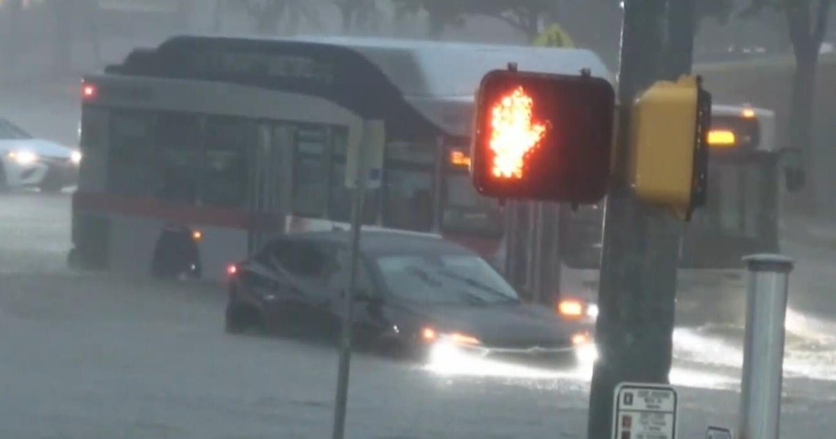 Roads submerged as floods sweep Texas