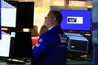 Stock markets hit record high despite inflation, high fuel prices