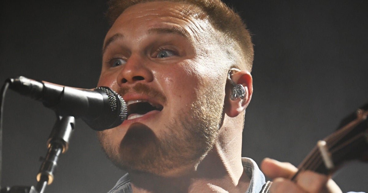 Zach Bryan wears "Free Palestine" shirt during concert at Gillette Stadium