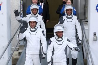 Crew launches to space station with astronaut who'll miss birth of 3rd child