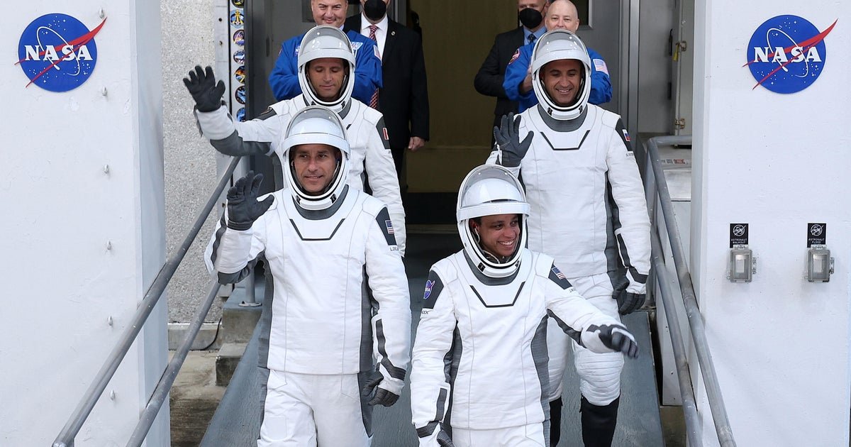 Crew launches to space station with astronaut who'll miss birth of 3rd child