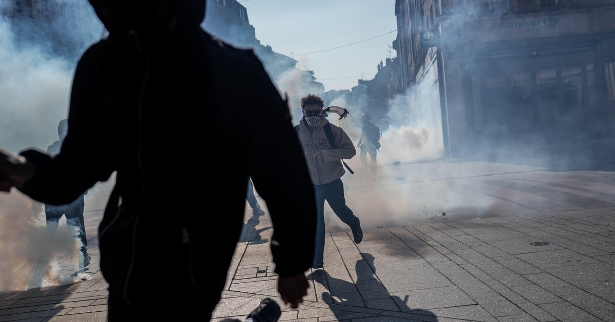 Teenager loses hand picking up grenade in France school protests