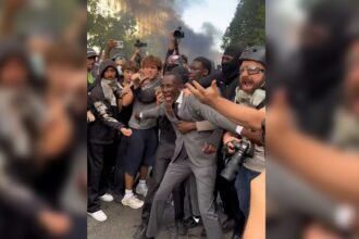 French mayor tear-gassed after shielding protesters from police