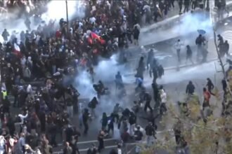 Police use tear gas and water cannons on student protestors in Paris
