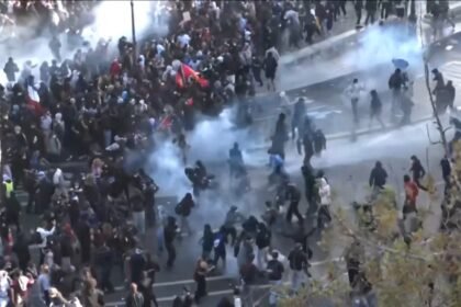Police use tear gas and water cannons on student protestors in Paris