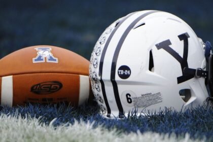 Reno throws for 4 TDs, leads Yale to win after death of father