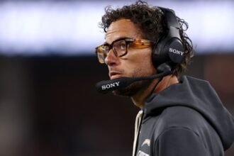Chargers' Harbaugh standing by OC McDaniel: 'Job is not in jeopardy'