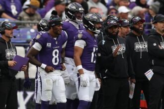 Lamar leaves stadium in boot after hurting ankle in Ravens' win
